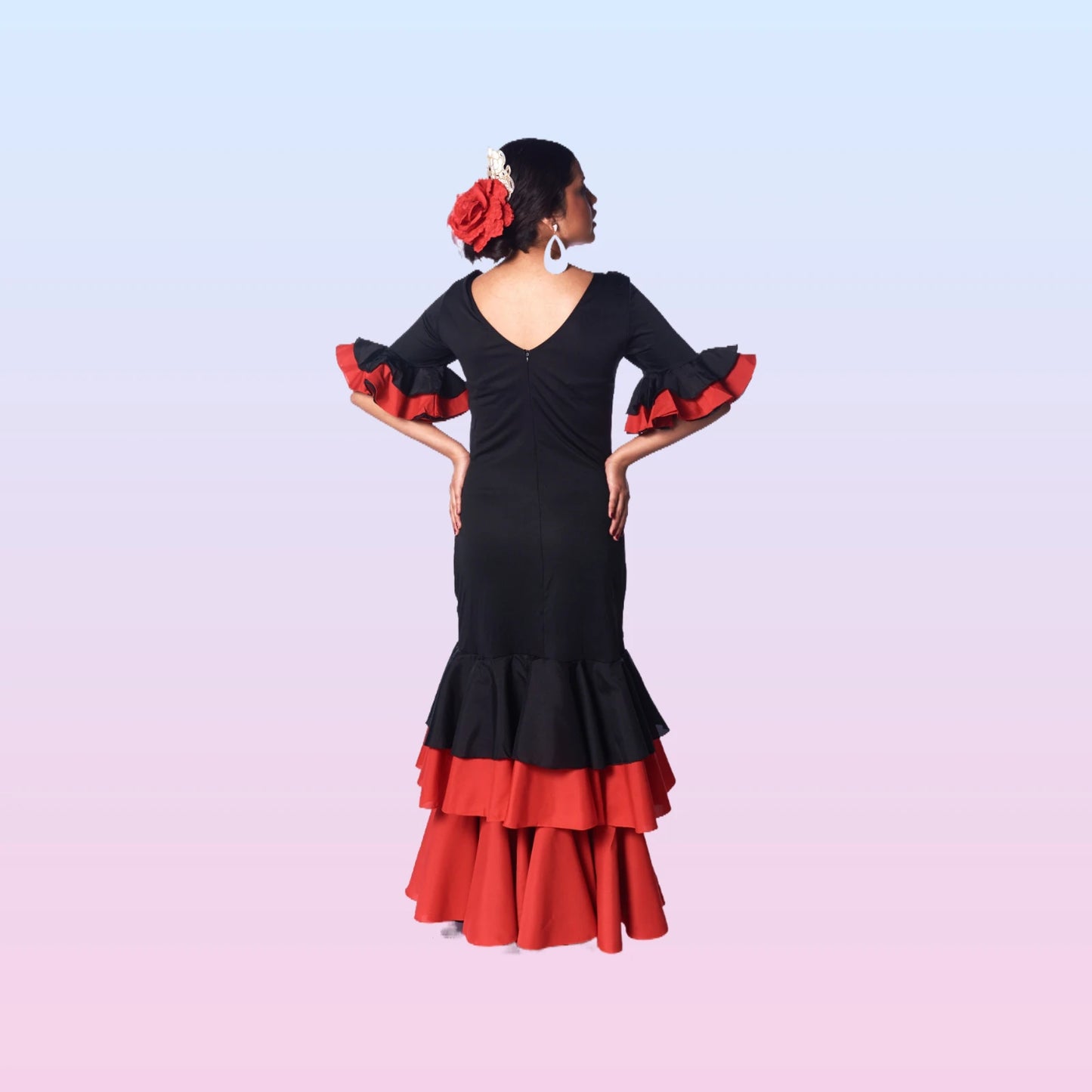 Black Flamingo dress with flower print on the side and with 3 ruffles and a predominant color